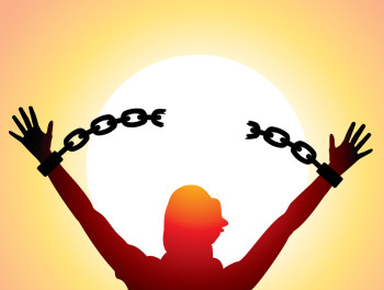 vector silhouette of a girl with raised hands and broken chains